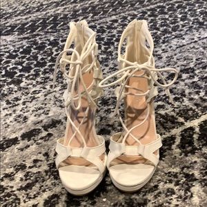 White gladiator heels never worn